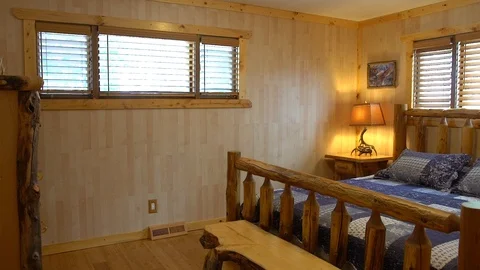 Bedroom in a log cabin Stock Footage 103955044
