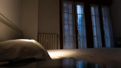 Bedroom at sunset Stock Photos