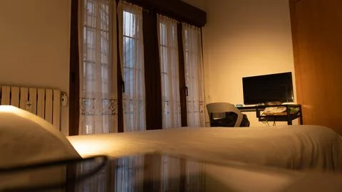 Bedroom at sunset Stock Photos