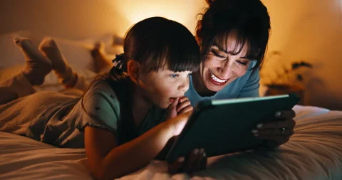 Bedroom, tablet and mom with kid for bonding, games and relaxing in home at Stock Footage 335534633