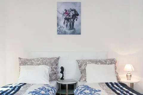 Bedroom with two beds Stock Photos