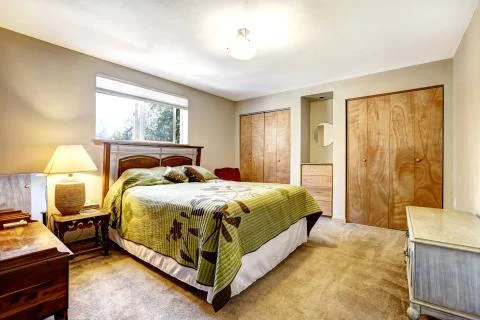 Bedroom with two closets Stock Photos