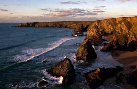 Bedruthan steps, cornwall, at sunset Stock Photos
