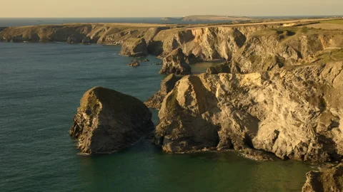 Bedruthin coastline in the evening light Cornwall England Stock Footage 130892979
