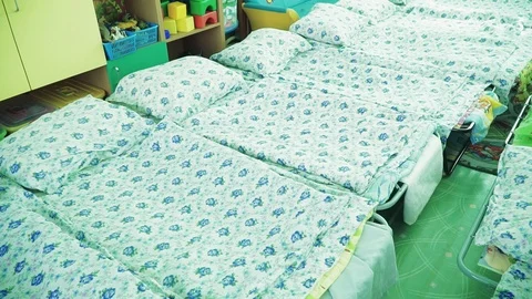 Beds in kindergarten ready to sleep Stock Footage 111797151
