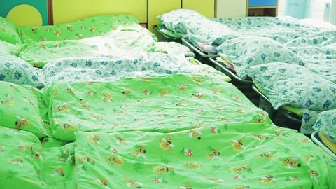 Beds in kindergarten ready to sleep Stock Footage 111797213