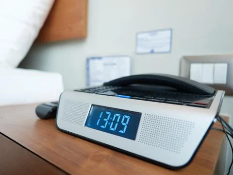 A bedside digital alarm clock Stock Photos