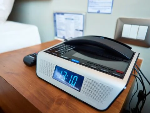 A bedside digital alarm clock Stock Photos