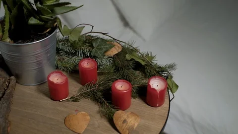 Bedside table with authentic Chrismas decoration and candles. Stock Footage 102658299