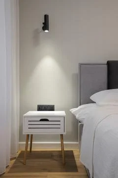 Bedside table in the bedroom interior Stock-Fotos