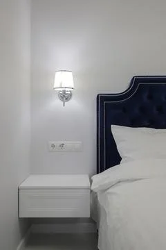 Bedside table in the bedroom interior 스톡 사진