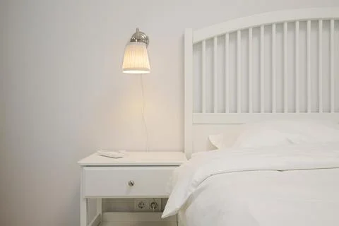 Bedside table in the bedroom interior Stock-Fotos