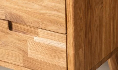 Bedside table with drawers close view photo, wooden eco furniture elements .. Stock Photos