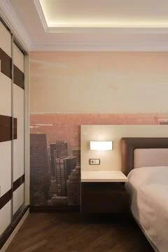 Bedside table with sconce in the bedroom Foto stock