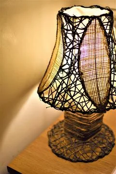 A bedside wicker lamp Stock Photos