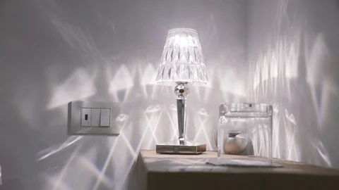 Bedside wooden table with light lamp Stock Footage 86171728