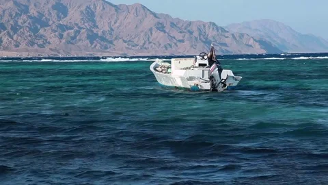 Beduin boat rocks on the waves in Dahab, Red Sea, Egypt Stock Footage 82685552