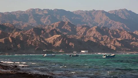 Beduin boats rock on the waves in Dahab, Red Sea, Egypt Stock Footage 82685567