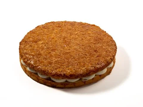 Bee sting cake, light cake with cream filling, with crispy almonds. Stock Photos