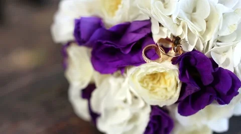 Bee on wedding bouquet, rings Stock Footage 49227793