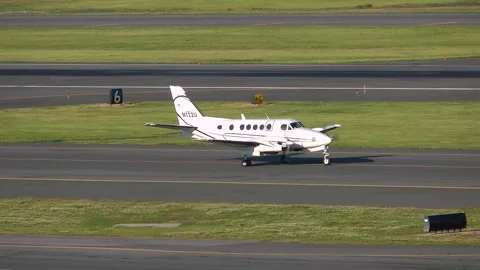 A Beech 100 King Air plane arrives at the airport Boston Mass. June 10 2012 Stock Footage 277116591