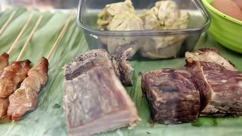 Beef and beef satay in the display case for beef soup, street food Stock Footage 273040272