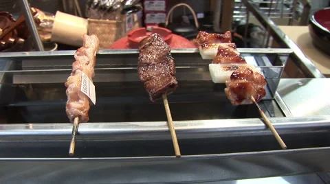 Beef and duck Kabobs on grill in Japan Video stock 5768355