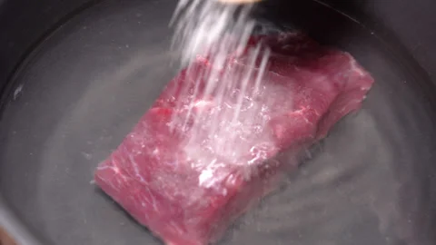 Beef boiled in a saucepan. High quality 4k footage Stock Footage 255600941