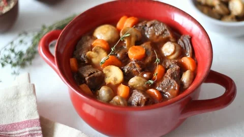 Beef bourguignon stew with carrots and mushrooms. French cuisine. Stock Footage 170111489