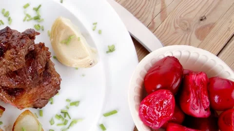 Beef bourguignon in wine with artichoke Vídeos de archivo 63968167