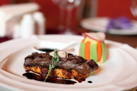 Beef with bread and vegetables Stock Photos