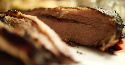 Beef brisket medium rare meat on a board Stock Footage 86297963