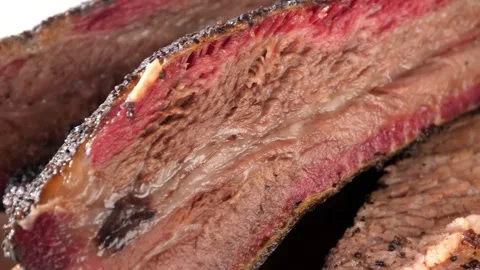 Beef Brisket with Sausage Bread Beans and Pickles BBQ Platter 動画素材 342583428