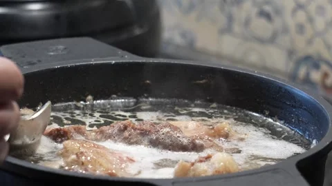 Beef broth. Boiling meat for cooking. Soup in the kitchen close up 4k video Stock Footage 315876480