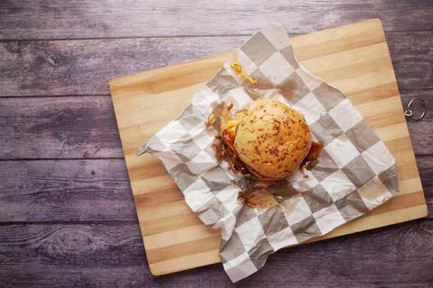 Beef burger on a chopping on table top view Stock Photos