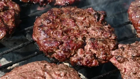 Beef burger for hamburger on barbecue flame grill Stock Footage 134817502