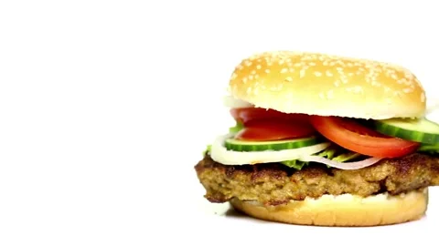 Beef burger rotating 360 loop on the black plate background. 4K UHD video Video stock 336578683