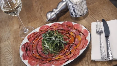 Beef carpaccio with arugula and balsamic acusus. Stock Footage 112389676