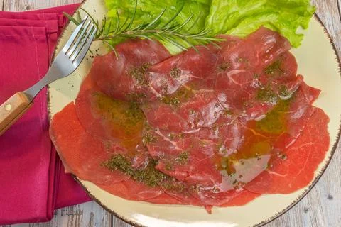 Beef carpaccio, close-up, on a plate Stock Photos