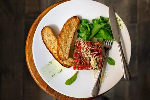 Beef Carpaccio on dark background Stock Photos