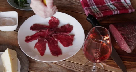 Beef carpaccio preparing, lemon juice 스톡 동영상 330406525