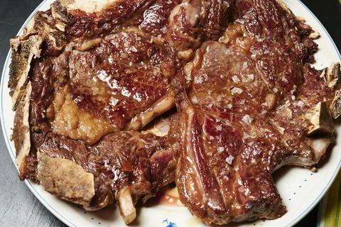 Beef chop with bone ready to eat Stock Photos