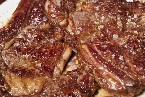 Beef chop with bone ready to eat Stock Photos