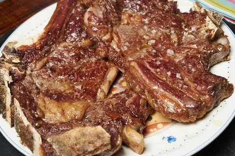 Beef chop with bone ready to eat Stock Photos
