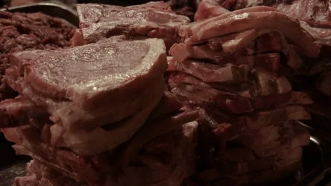 Beef chop cut of meat butcher shop food in market Stock-Footage 235370356