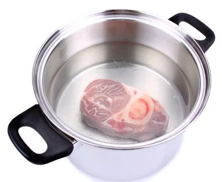 Beef cooked in a metal pot Stock Photos
