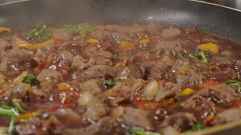 Beef Cubes with Vegetables in Soy Sauce Stock Footage 321770740