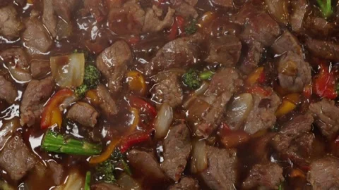 Beef Cubes with Vegetables in Soy Sauce Stock Footage 321770746