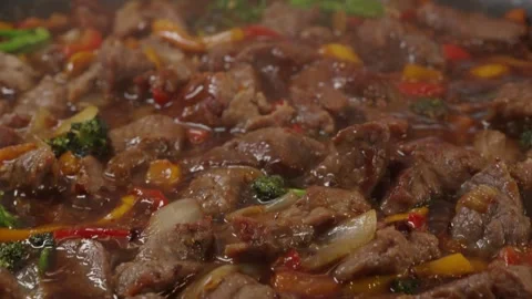 Beef Cubes with Vegetables in Soy Sauce Stock Footage 321770749