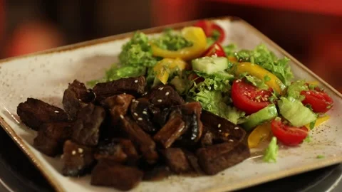 Beef dish and salad 3 Stock Footage 312929120